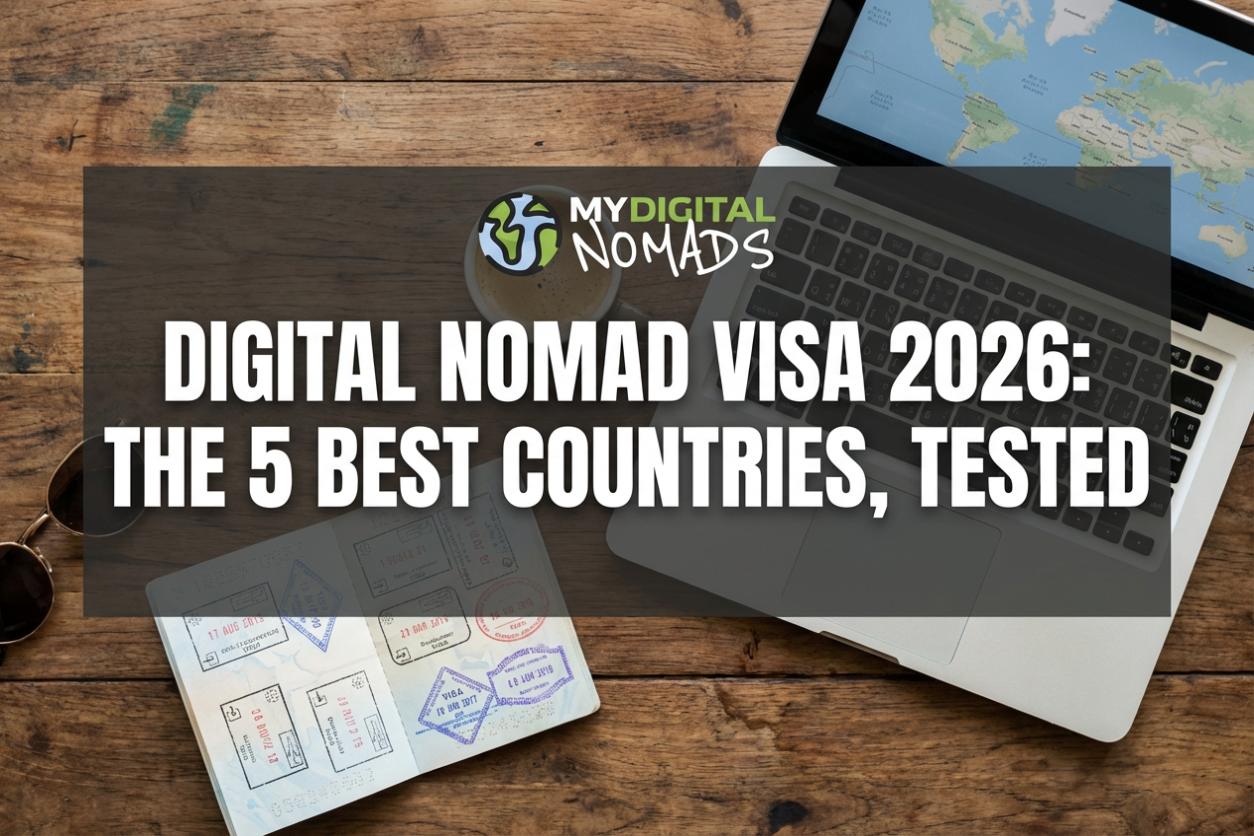 Digital nomad visa - passport with visa stamps and laptop on wooden desk