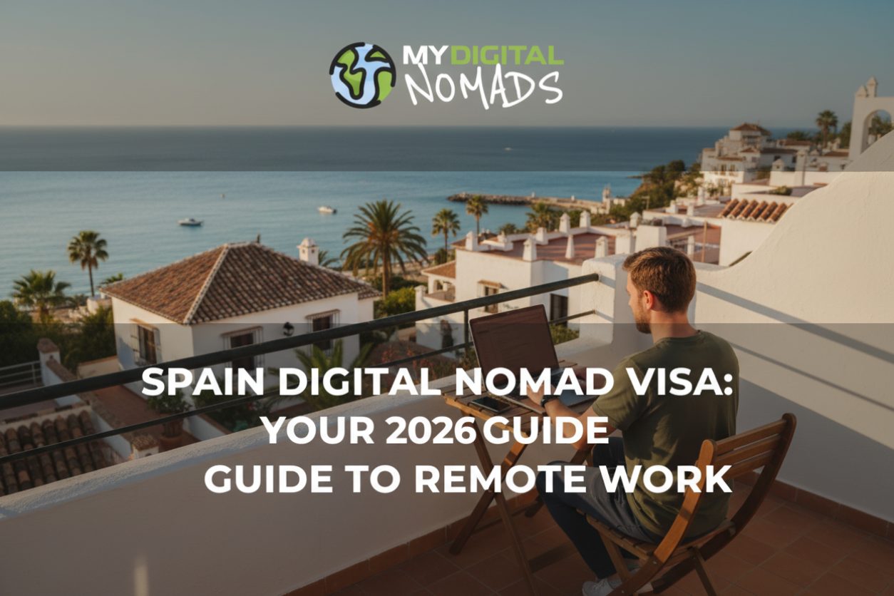 A digital nomad works on a laptop overlooking the Spanish coast, enjoying the Spain Digital Nomad Visa.